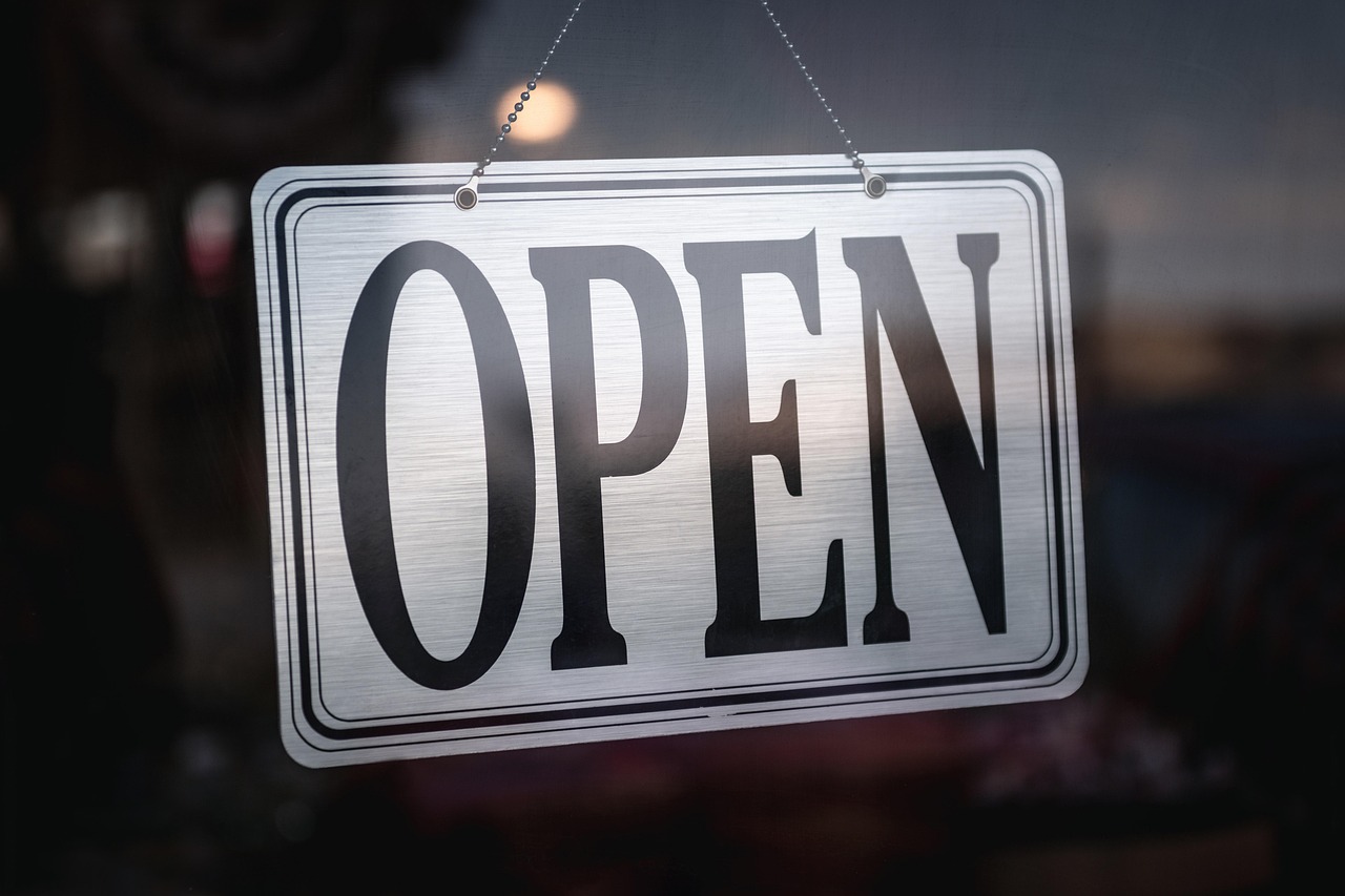 Storefront promotion sign marking a closing sale — US sportsbooks have dramatically scaled back risk-free and free-bet promotions since 2023