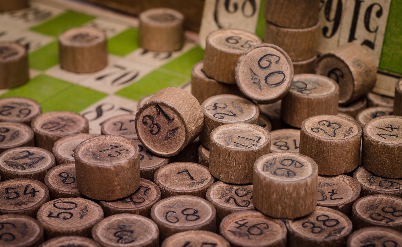 Lottery numbers on a ticket — parlays share more in common with lottery products than with skill-based wagering