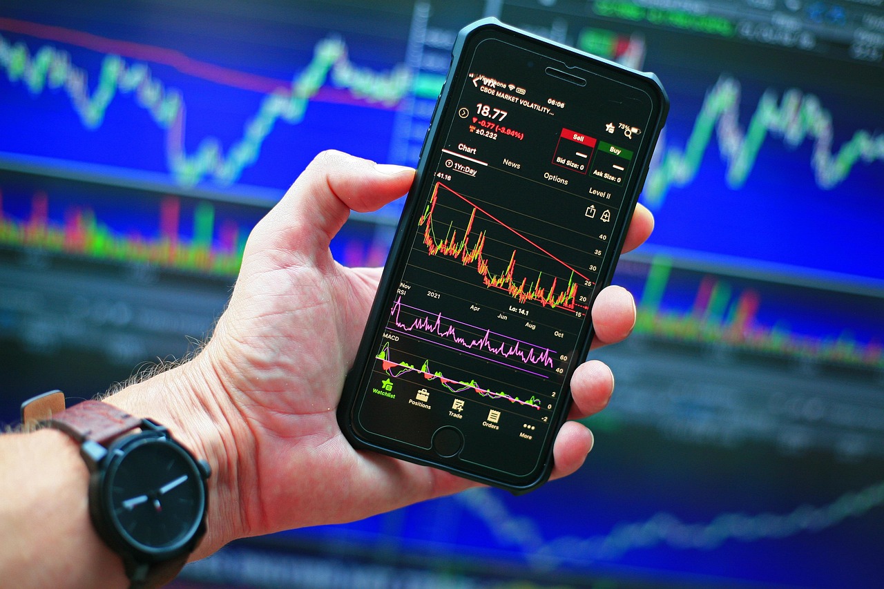 Trading-screen monitors with rapid price movement — modern steam moves are algorithmic cascades across dozens of books